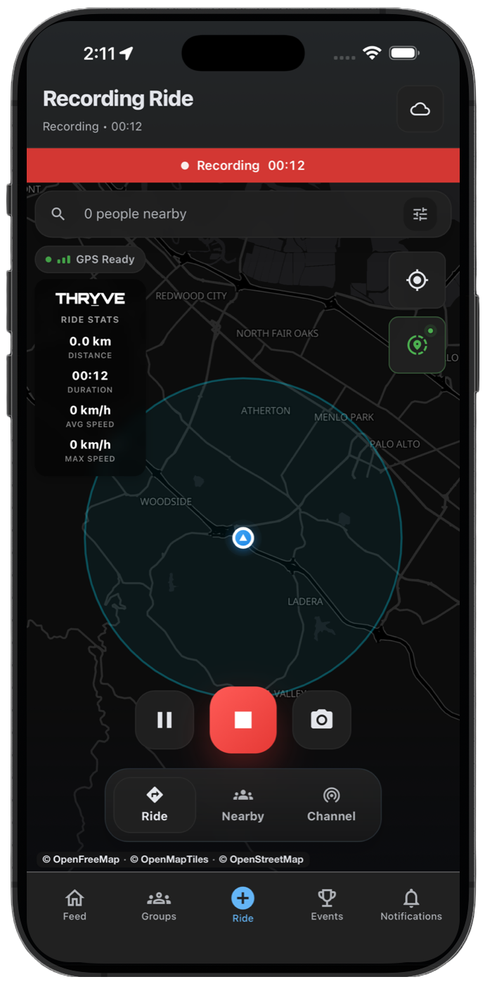 THRYVE live GPS recording with route, stats, pause, stop, and photo controls